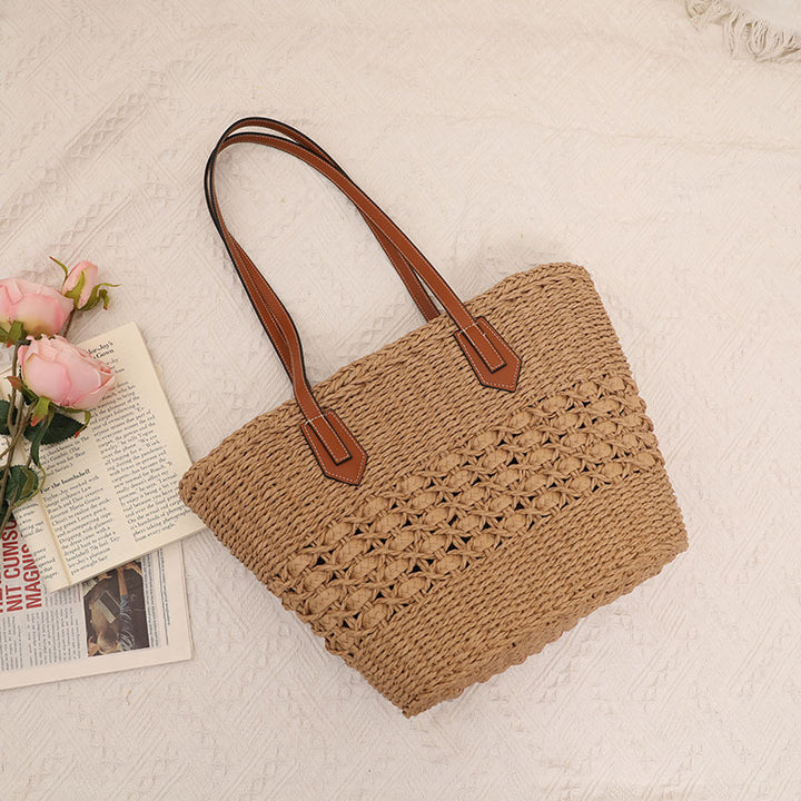Handmade rattan basket bag with elegant leather details Skanto