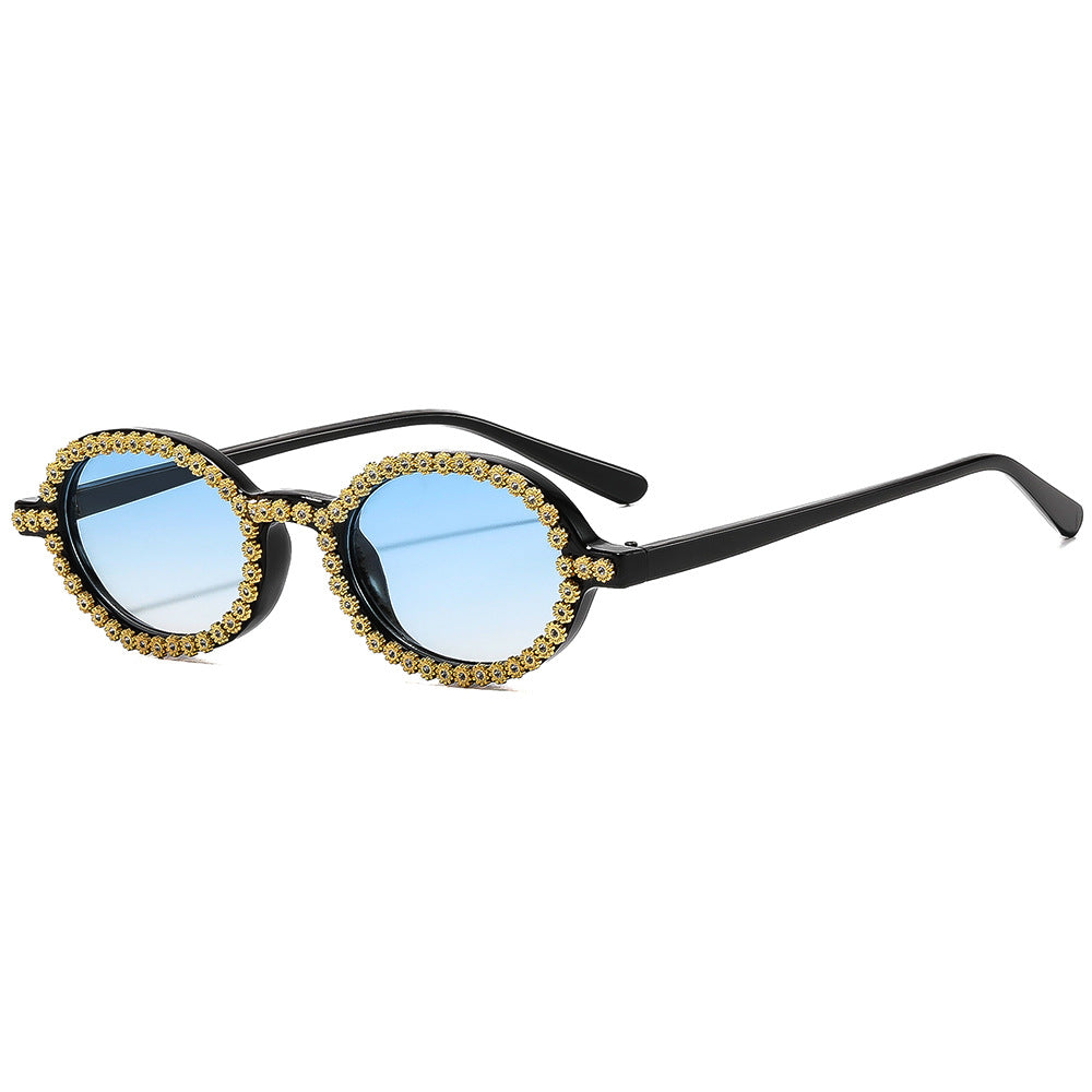 Damer moteriktig solbrille med blomstrete krystallramme Skanto