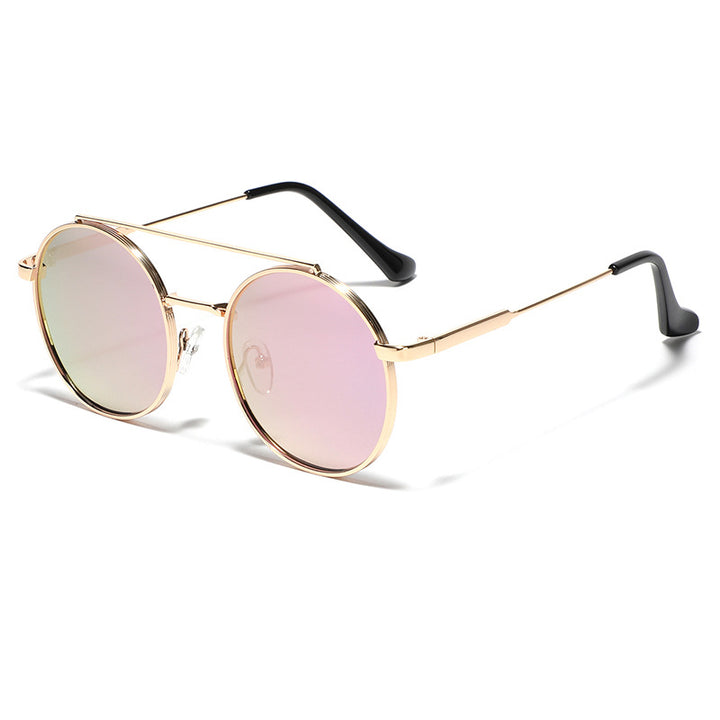 Dame rund solbrille med moteramme Skanto