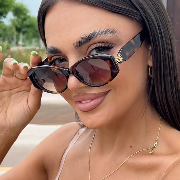 Dame elegant solbrille med stilige konturer Skanto