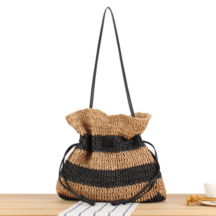 Handbag made of handmade natural fiber blend with modern drawstring closure Skanto