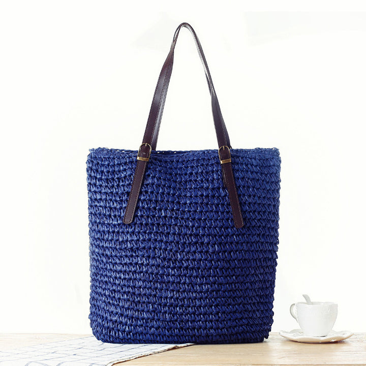 Handbag made of handmade natural material with sturdy leather handles Skanto