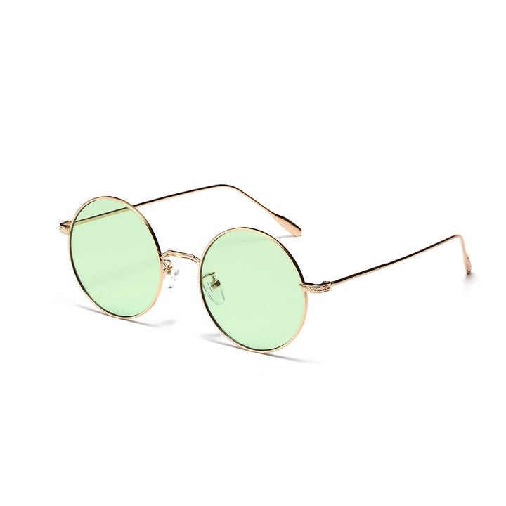 Dame rund moteriktig solbrille med glamorøs ramme Skanto