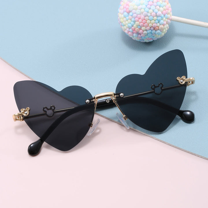 Damer hjerteformet solbrille med dekorert ramme Skanto