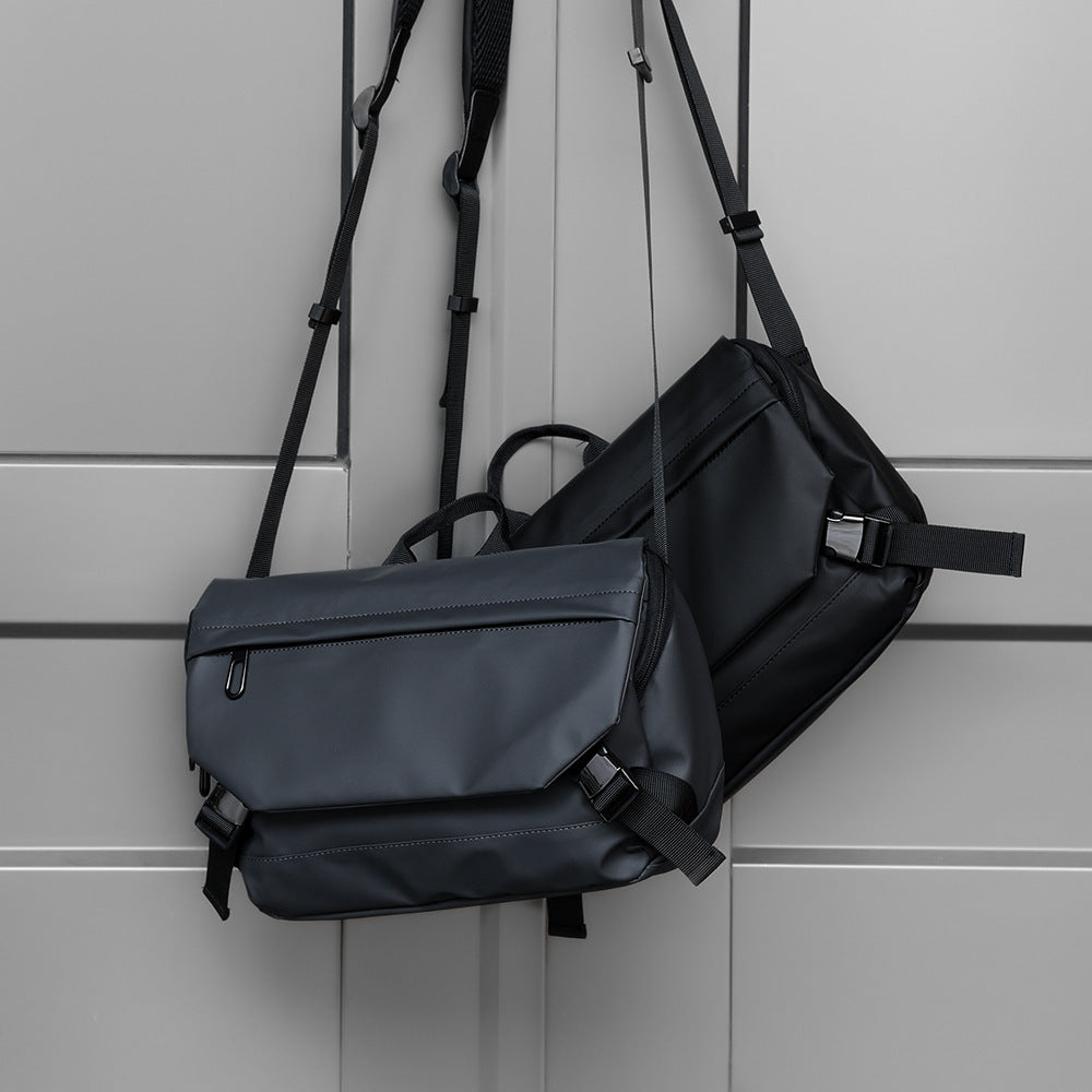 Allsidig messenger-veske med organizer-lommer Skanto