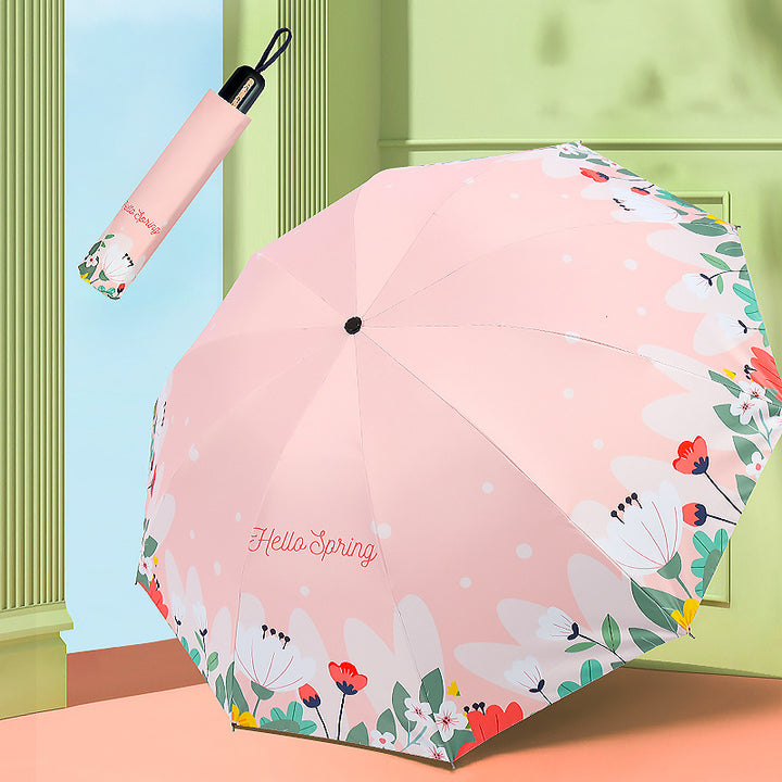 Kvinnes sammenleggbare paraply med blomsterdesign Skanto