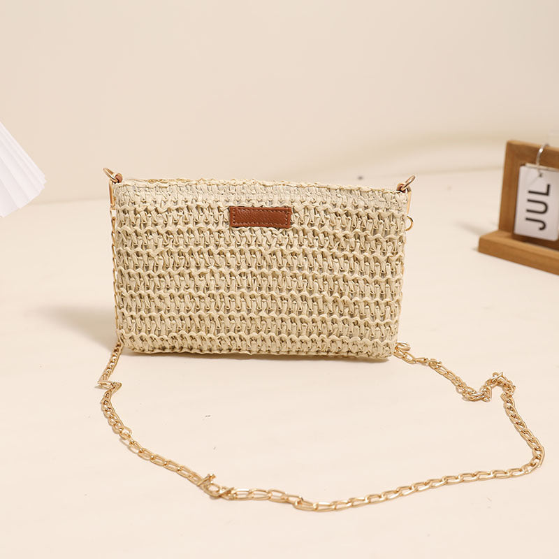 Handmade crossover bag of durable bast material with gold chain Skanto