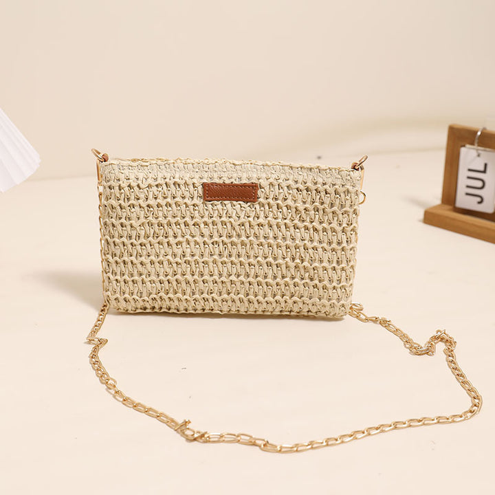 Handmade crossover bag of durable bast material with gold chain Skanto