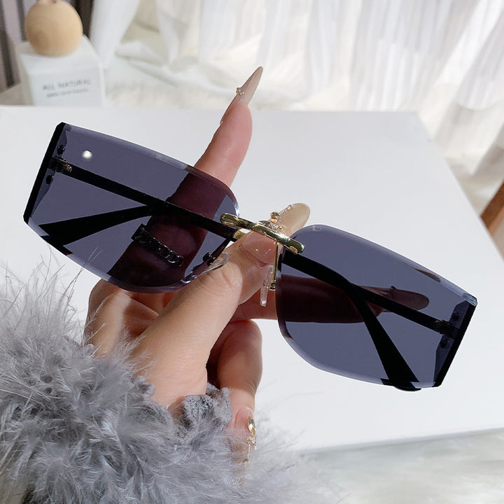 Dame elegant solbrille med høyverdig geometrisk design Skanto
