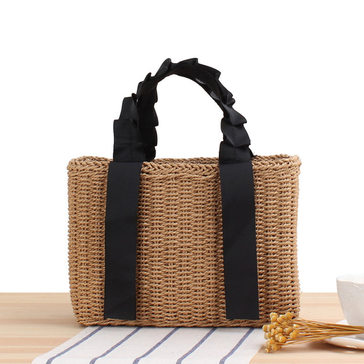 Playful basket bag with elegant fabric handle Skanto