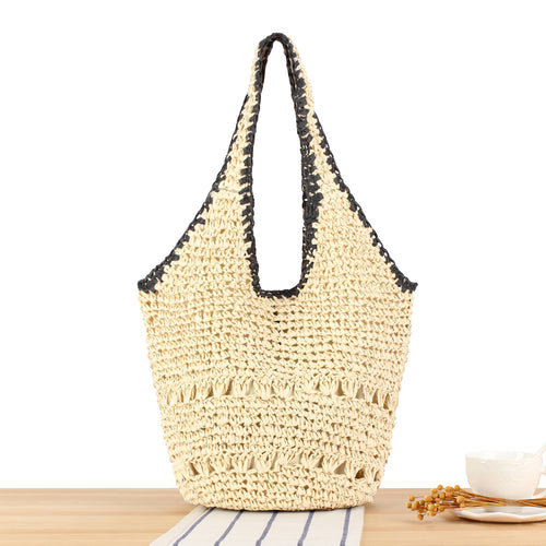 Beach shoulder bag made of hand-woven natural material with comfortable carrying handles Skanto