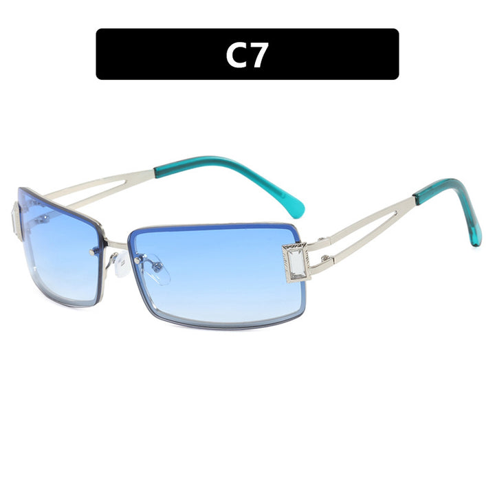Stylish women's sunglasses with elegant trapezoidal lenses and filigree metal frame Skanto