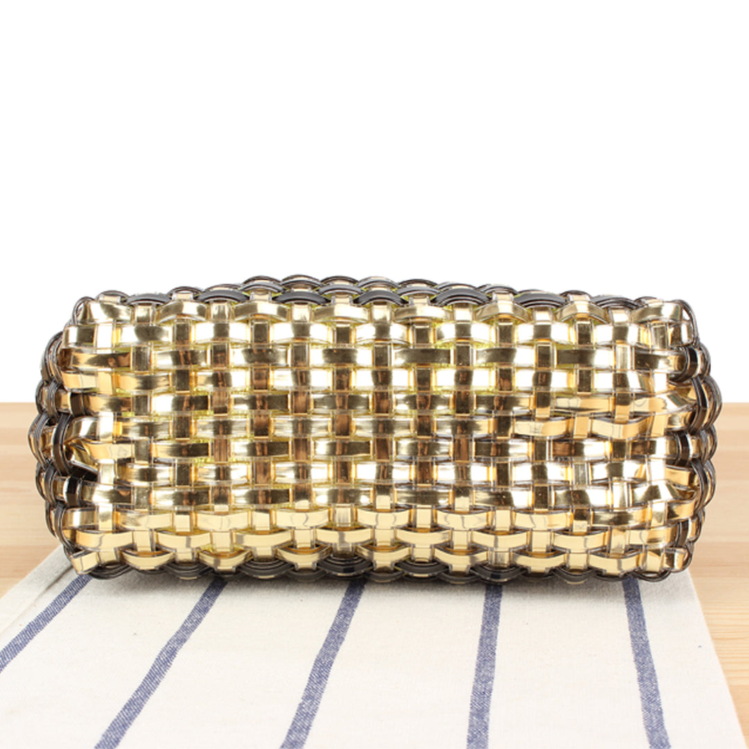 Shoulder bag made of hand-woven synthetic material with fashionable sliding mechanism Skanto