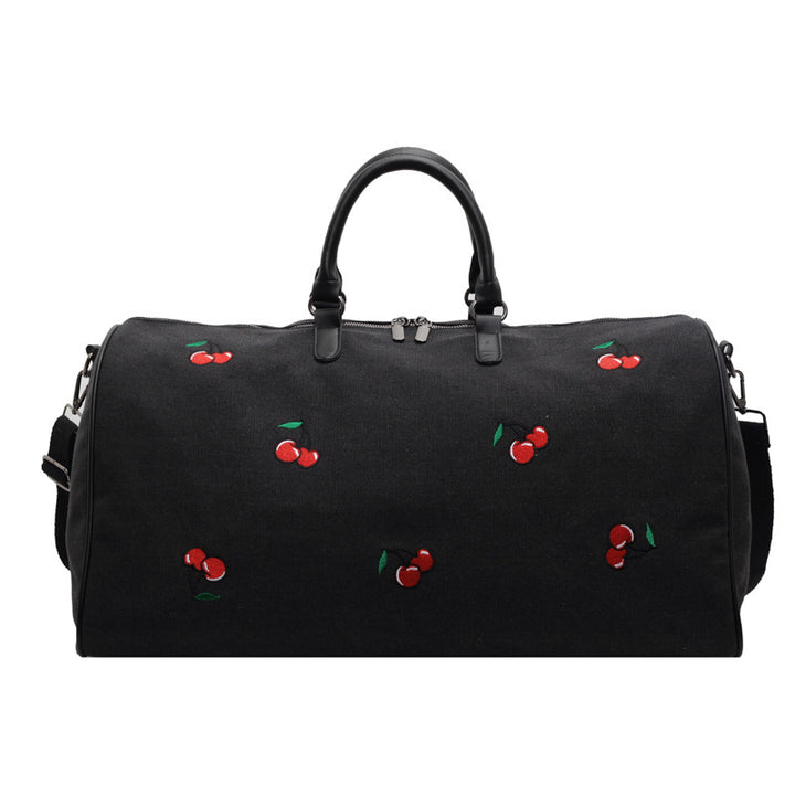 Sporty weekend bag with playful cherry pattern Skanto