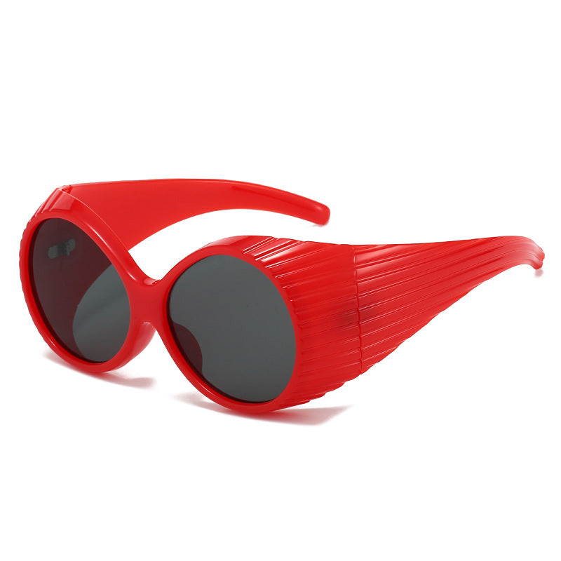 Dame Ekstravagant Solbrille med unikt bølgedesign Skanto