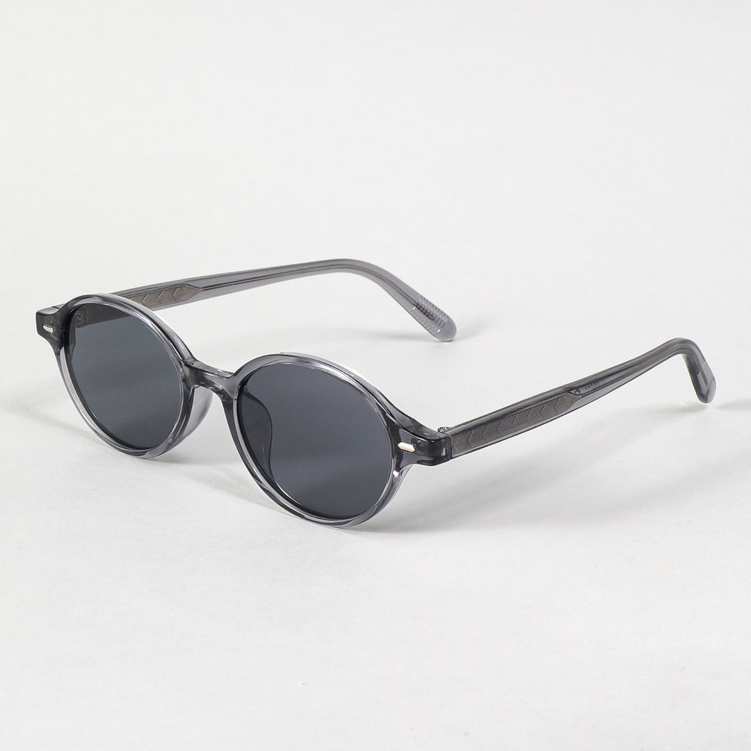 Dame moteriktig solbrille i oval design med stilige detaljer Skanto