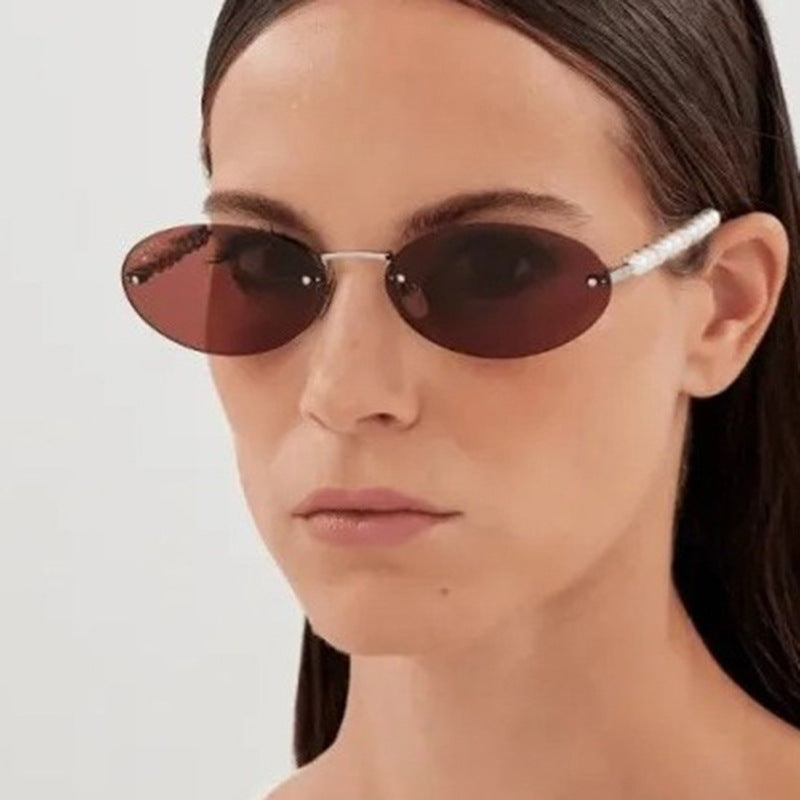 Women's stylish oval sunglasses with elegant decorations Skanto