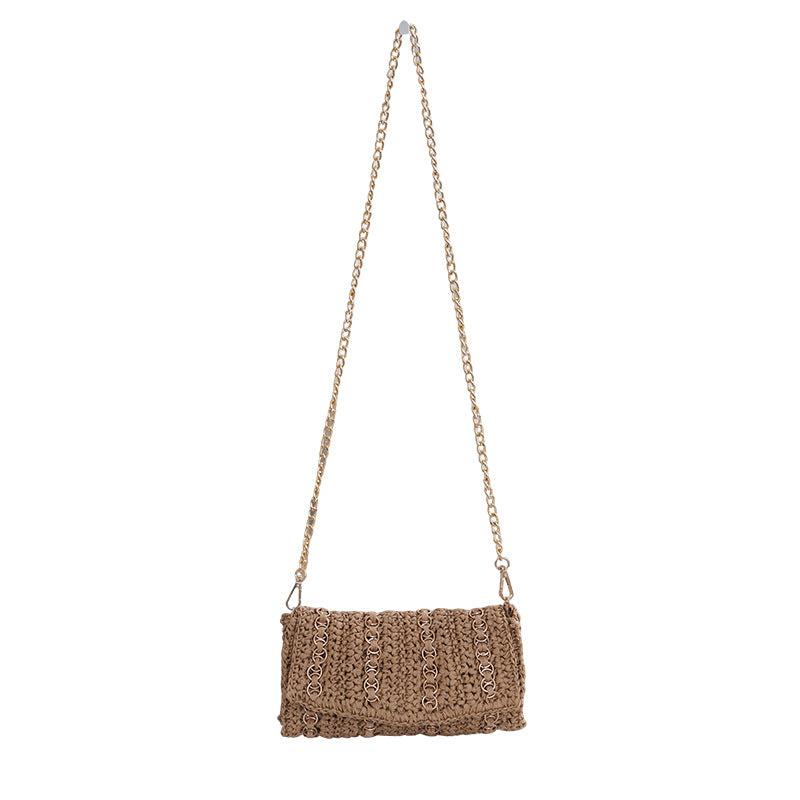Clutch med kjedehank og håndlaget makramee Skanto