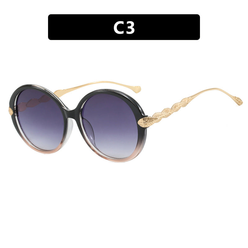 Women's large round sunglasses with decorative metal accents Skanto