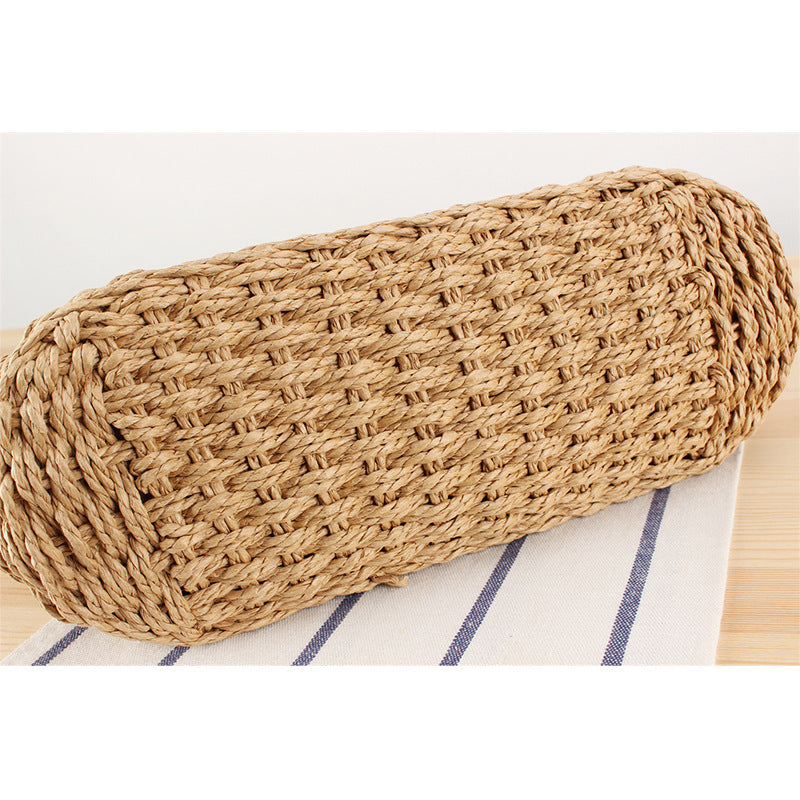 Handbag made of hand-woven straw with elegant faux leather handles Skanto