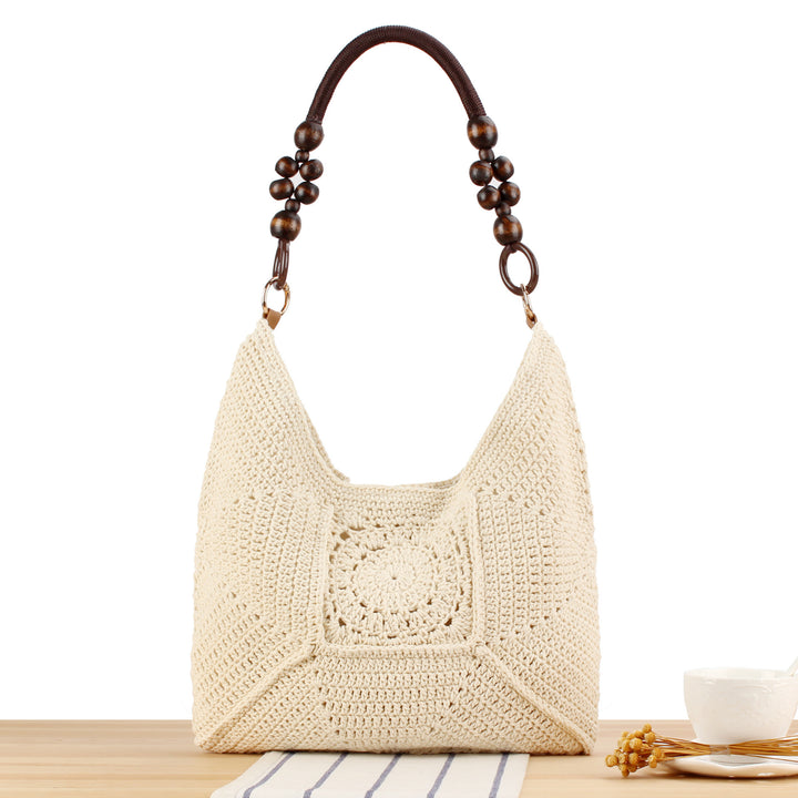 Handbag made of hand-knotted natural material with stylish wooden handles Skanto