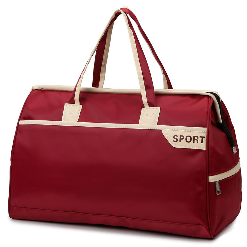 Sporty reisetasche med forsterkede håndtak og romslig interiør Skanto