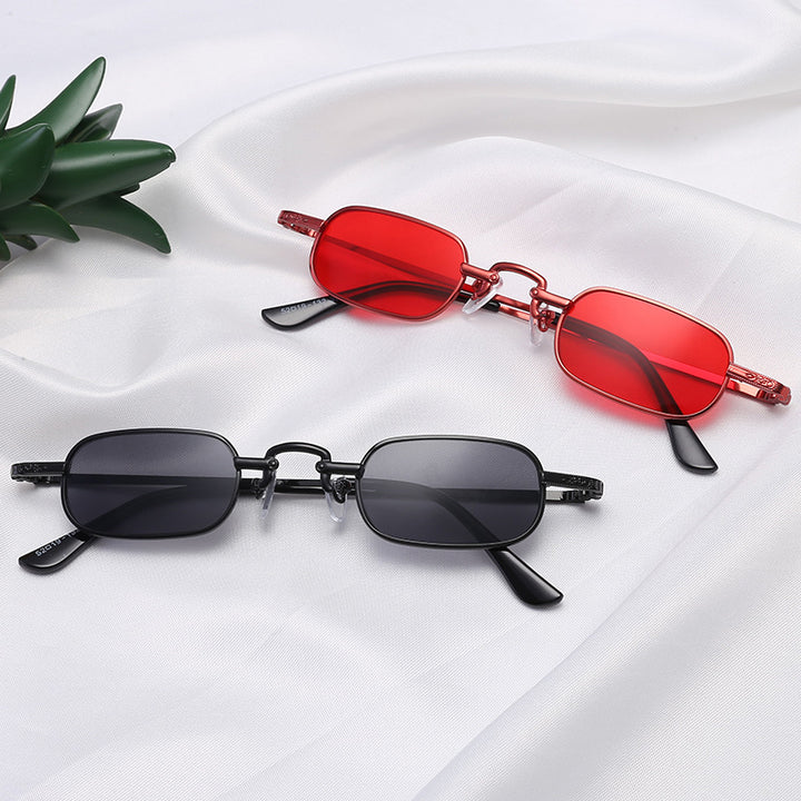 Damer Elegant solbrille med filigranramme og UV-beskyttelse Skanto