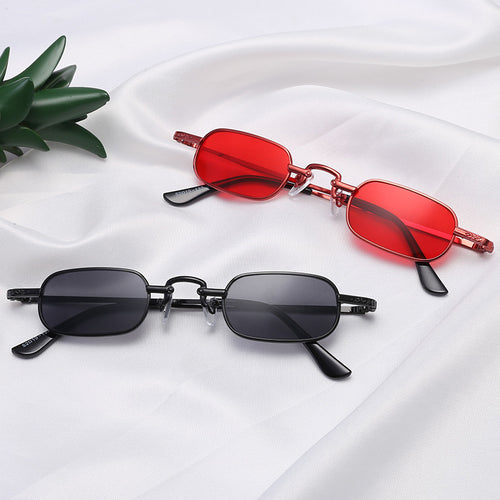 Damer Elegant solbrille med filigranramme og UV-beskyttelse Skanto