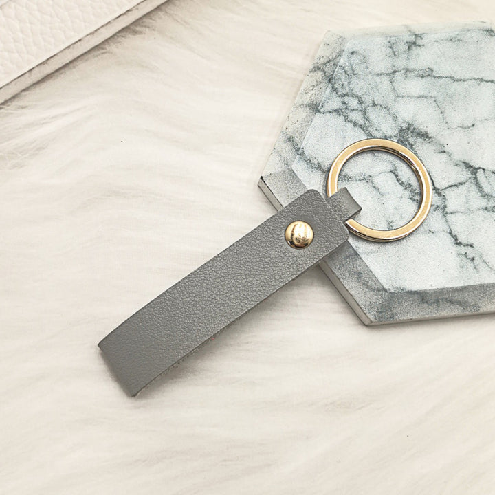 Unisex nøkkelring i høy kvalitet av kunstskinn med stiløs design Skanto