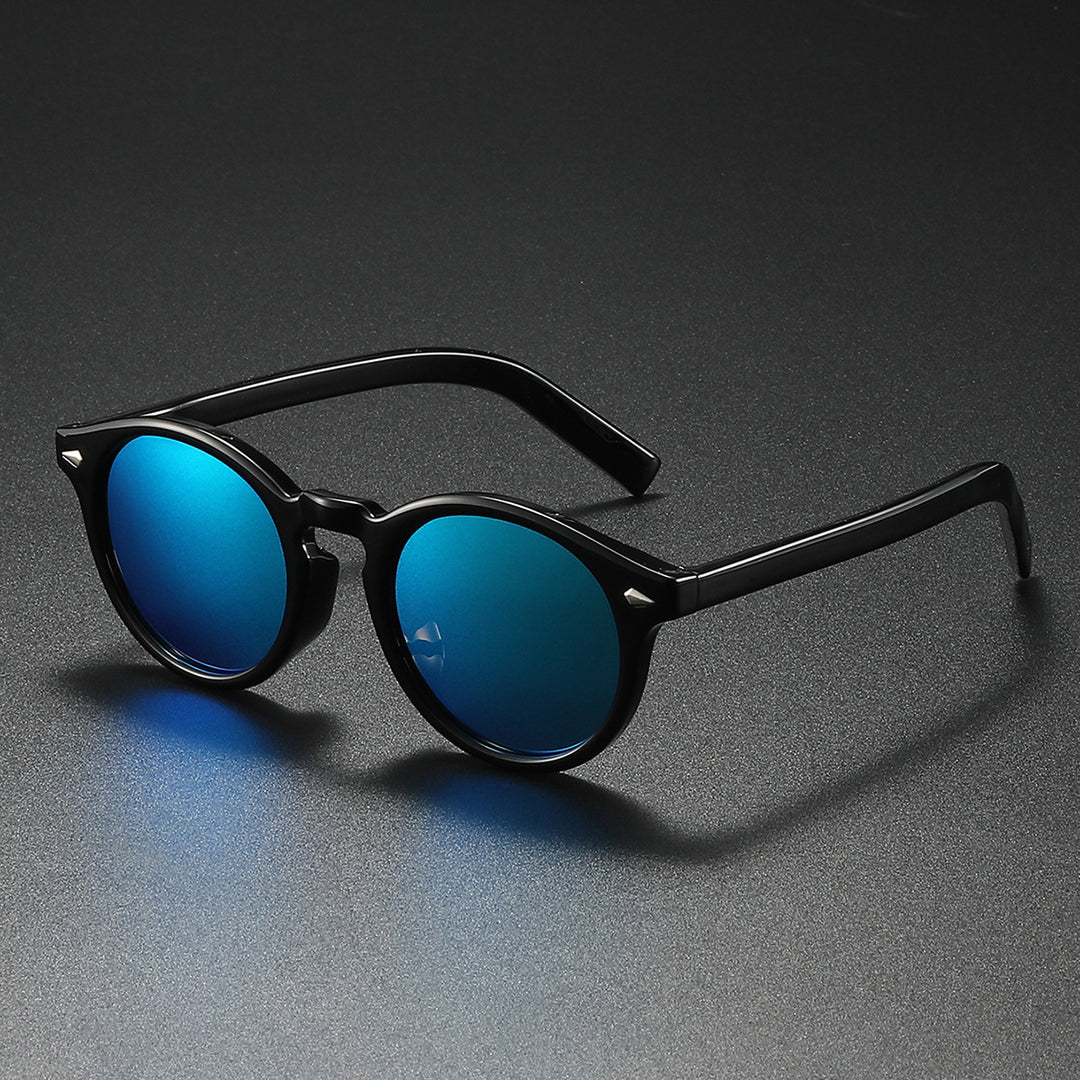 Dame Rund-solbrille med transparent ramme og reflekterende glass Skanto