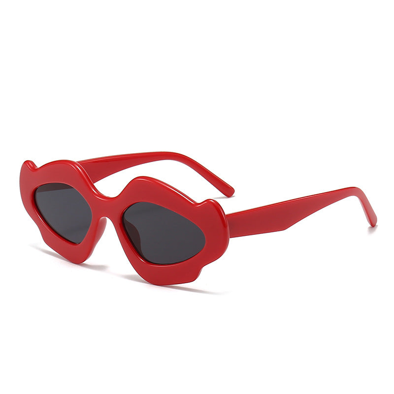 Dame moteriktig solbrille med unik blomsterramme Skanto