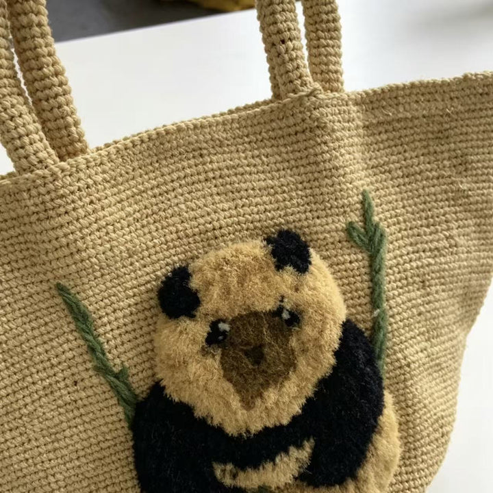 Sørhavsvennlig kurvveske med pandamotiv Skanto