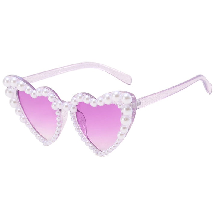 Dame hjerteformet solbrille med perlebesatt ramme Skanto