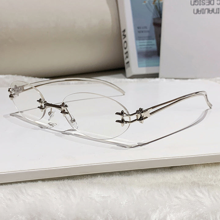 Women's elegant metal glasses with filigree design Skanto