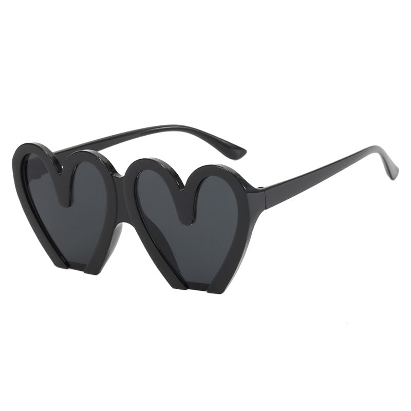 Damer hjerteformet solbrille med robust plastramme og UV-beskyttelse Skanto