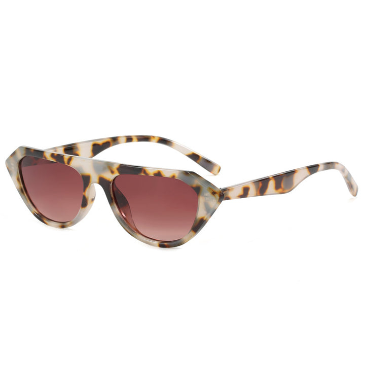 Dame moteriktig asymmetrisk solbrille Skanto