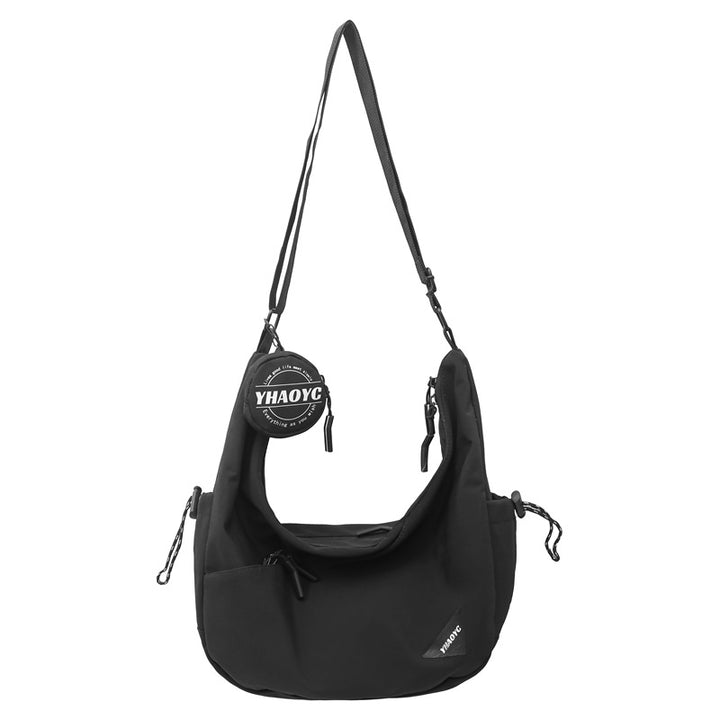 Stilfull skulderveske med flere glidelåslommer Skanto