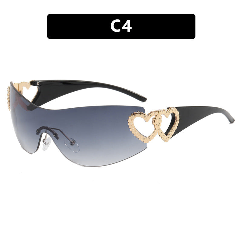 Dame Fashion-solbrille med hjerte-applikasjoner Skanto
