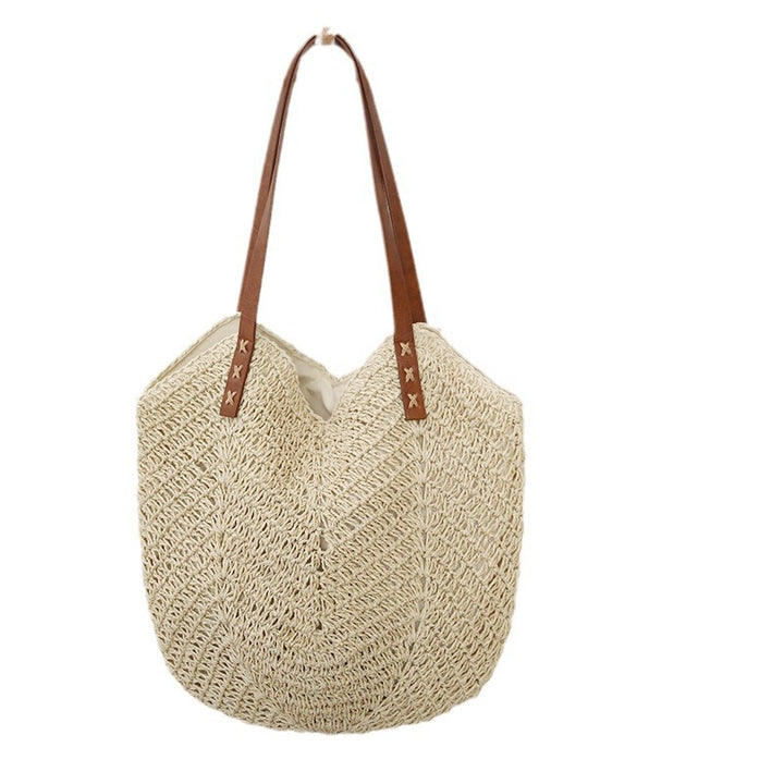 Braided basket bag with sturdy leather handles Skanto