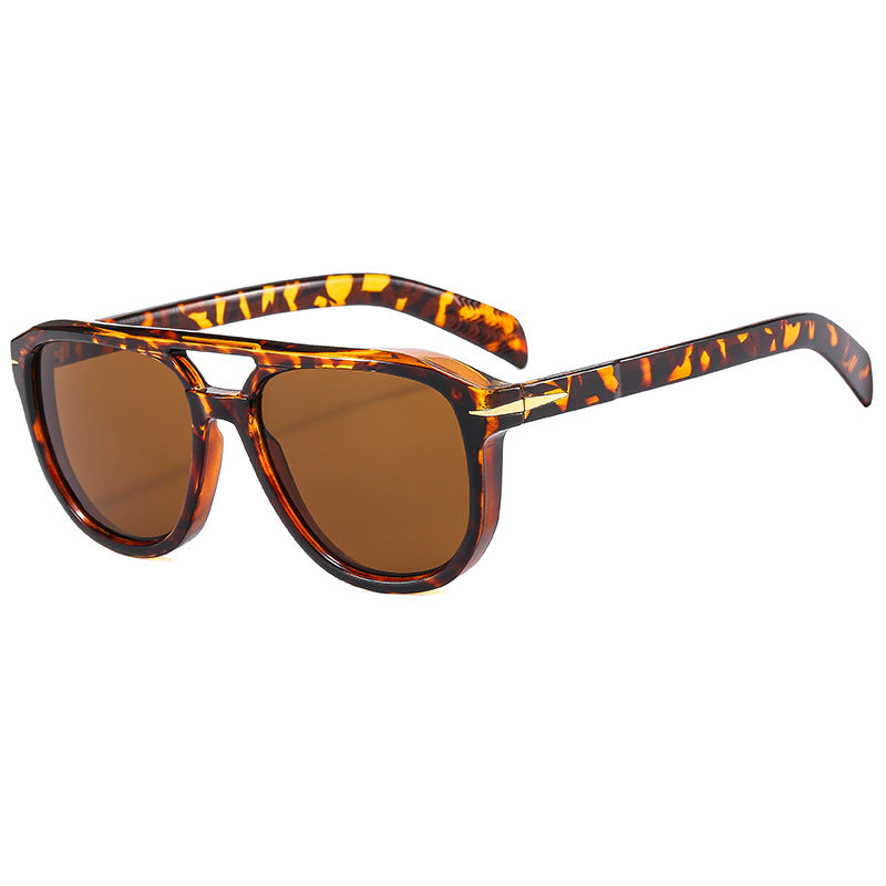Dame solbrille med markant ramme og beskyttende linser Skanto