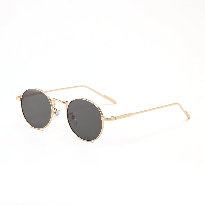 Dame rund modisk solbrille med elegant design Skanto