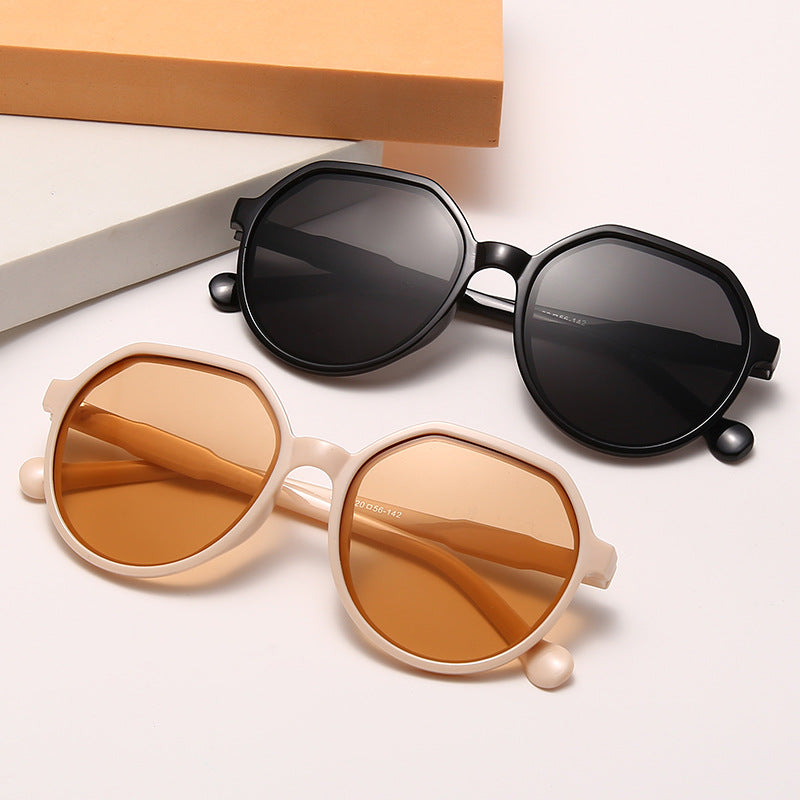 Dame moter solbrille med markant åttekant-design Skanto
