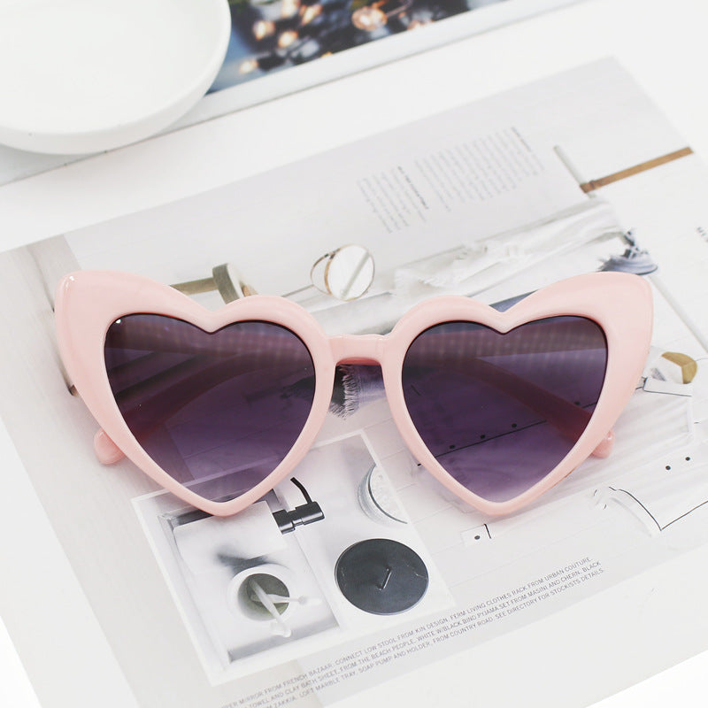 Dame hjerteformet solbrille med glitrende ramme Skanto