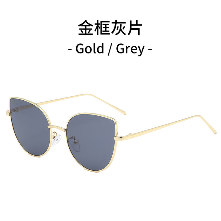 Dame cat-eye solbrille med filigran gullramme Skanto