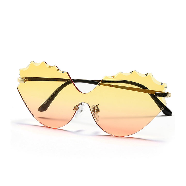 Dame solbrille med unik bølgedesign Skanto