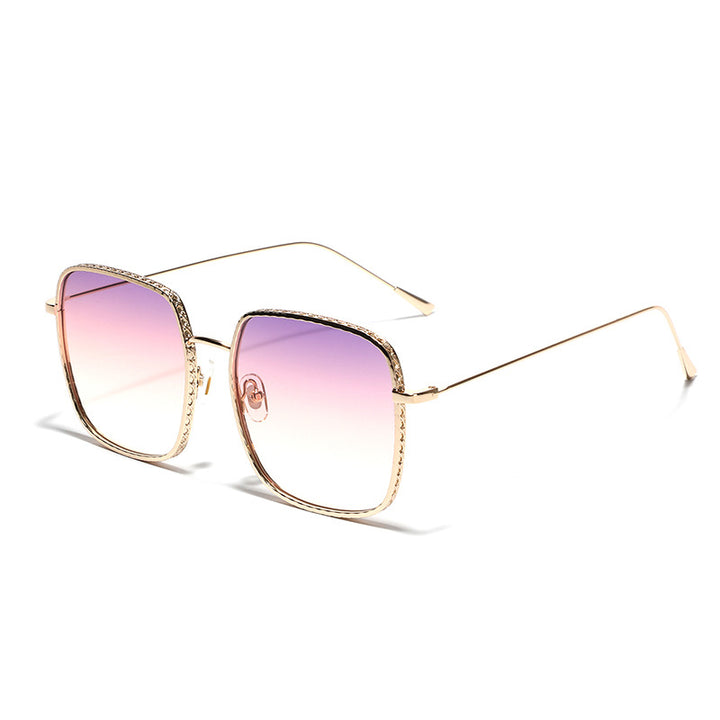 Damer oversized solbriller med elegante detaljer Skanto