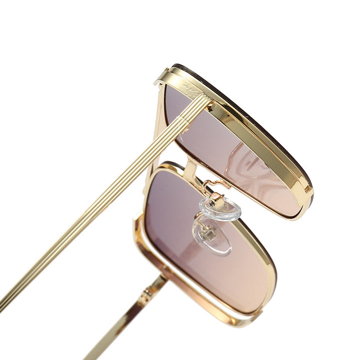 Dame modiske firkantede solbriller med elegant metallramme Skanto