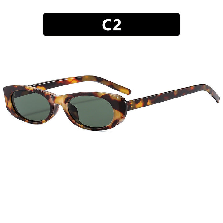 Dame moteriktig solbrille i elegant oval ramme Skanto