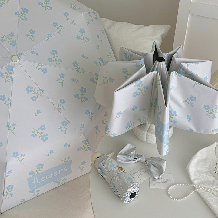 Damer Faltende Paraply med stilfullt blomsterdesign Skanto