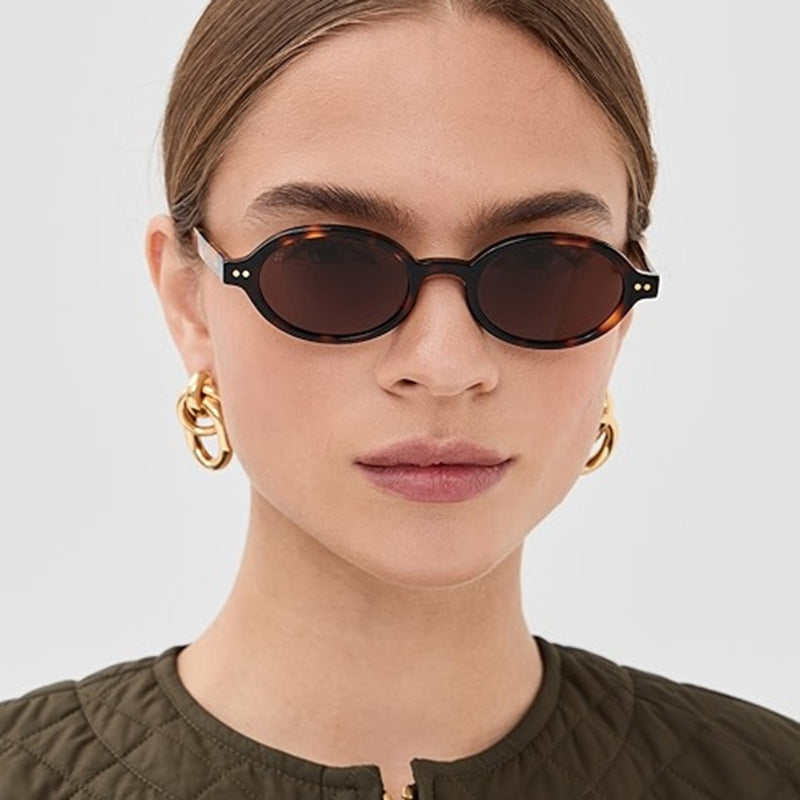 Women's modern oval sunglasses with unusual frame Skanto